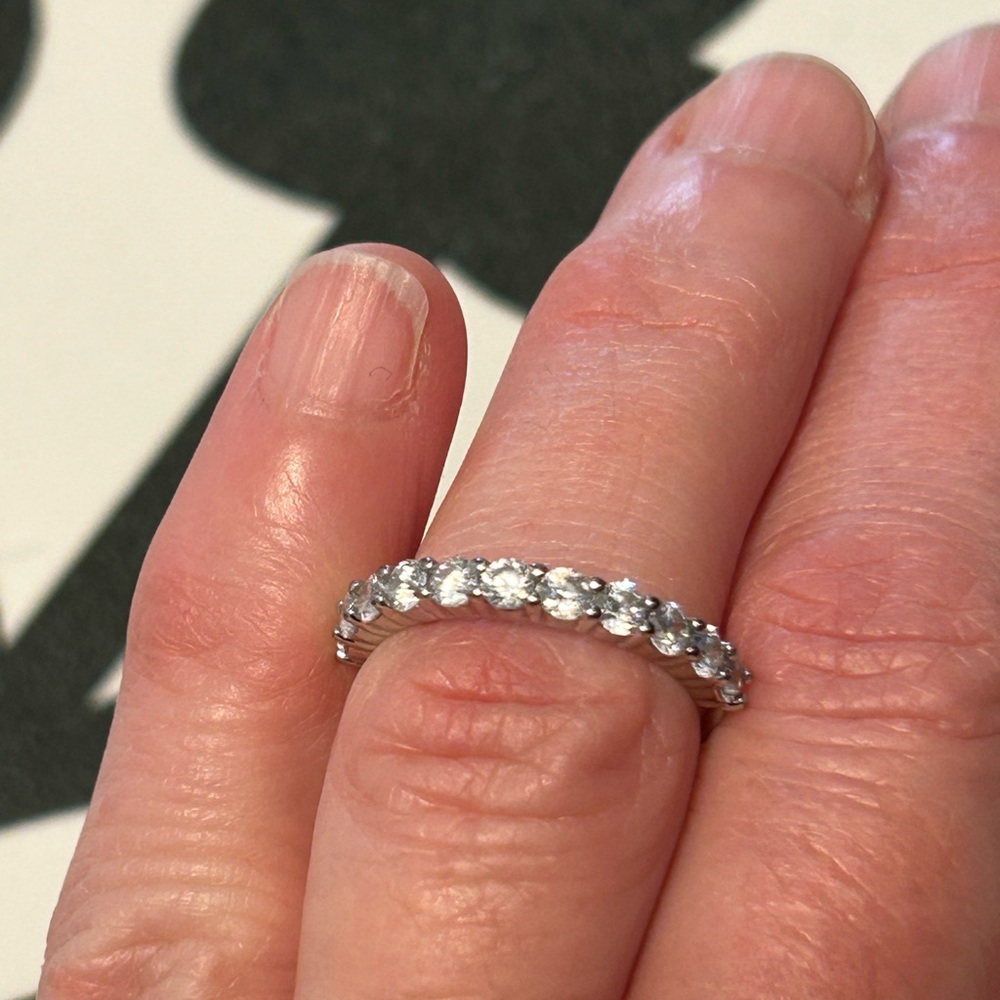 Sterling silver and cubic zirconia, 1/2 band, size US 4.
